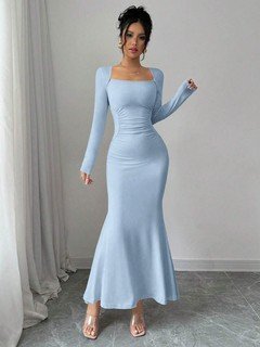 Angled front view of the light blue square-neck fishtail maxi dress, showing its silhouette and design details.