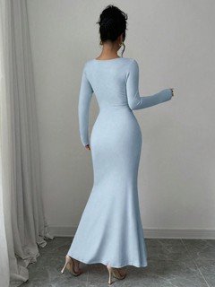 Back view of the light blue square-neck fishtail maxi dress, showing its silhouette and design details.