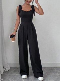 Front view of the black square-neck tie-strap wide-leg jumpsuit, showing the silhouette and fit.