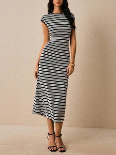 Front view of the black and white striped knit bodycon midi dress, showing its silhouette and design details.