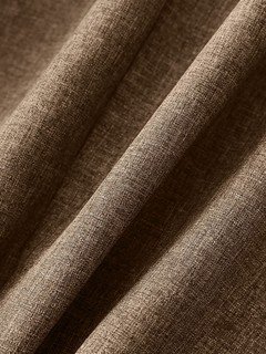 Fabric detail of the brown striped-cuff three-quarter-sleeve tailored blazer, showing rolled striped cuffs, notched lapels and tailored fit.