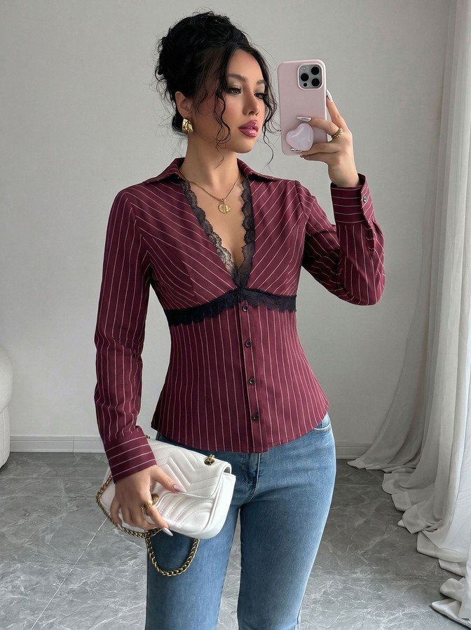Front view of the burgundy striped lace-trim v-neck long-sleeve top, showing the silhouette and fit.