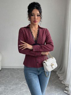 Styled front view of the burgundy striped lace-trim v-neck long-sleeve top, showing the silhouette and fit.