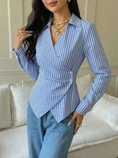 Front view of the blue striped asymmetric wrap shirt, showing its silhouette and design details.