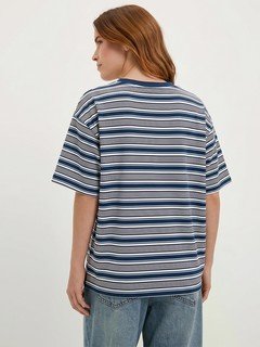 Back view of the blue and gray striped oversized crew-neck tee, showing its silhouette and design details.