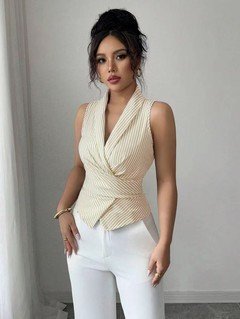 Front view of the cream striped sleeveless wrap blouse, showing its silhouette and design details.