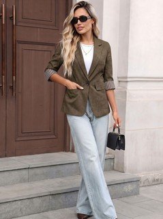Styled front view of the brown striped three-quarter-sleeve single-button blazer, showing the silhouette and fit.