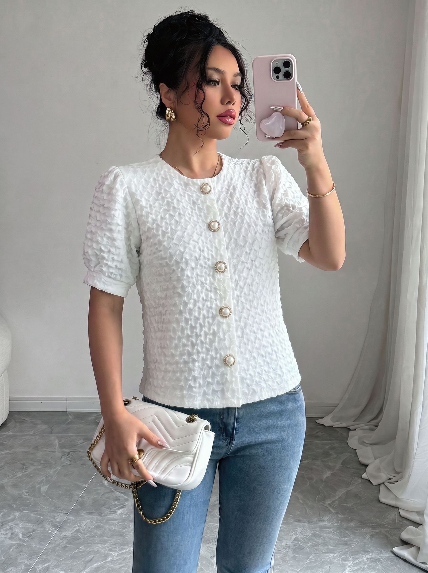 White Textured Button-Front Short-Sleeve Blouse – Front View Front view of the white textured button-front short-sleeve blouse, showing the silhouette and fit.