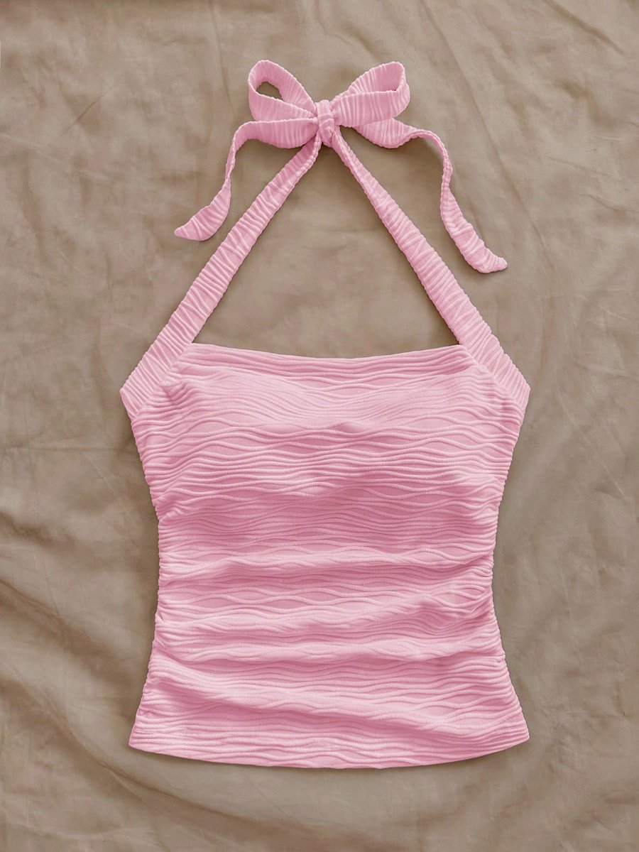 Pink Textured Tie-Halter Tank Top – Flat Lay Flat-lay view of the pink textured tie-halter tank top, showing the garment shape and finish.