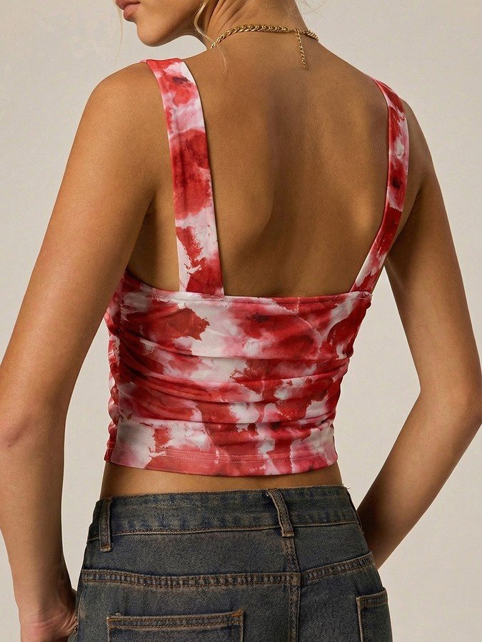 Back view of the red and white tie-dye v-neck cropped tank top, showing its silhouette and design details.