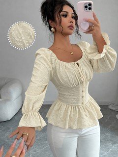 Front view of the cream tie-neck corset peplum blouse, showing its silhouette and design details.