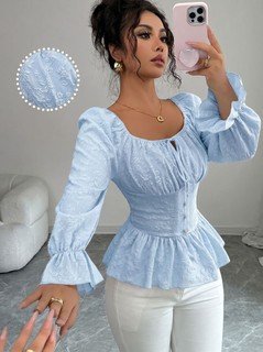 Front view of the light blue tie-neck corset peplum blouse, showing its silhouette and design details.