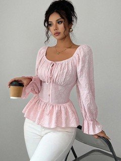 Front view of the pink tie-neck corset peplum blouse, showing its silhouette and design details.