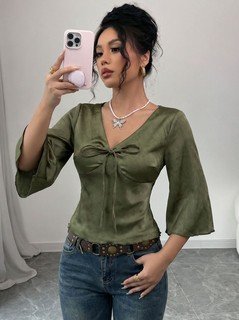 Front view of the olive v-neck bell-sleeve tie-waist blouse, showing the silhouette and fit.