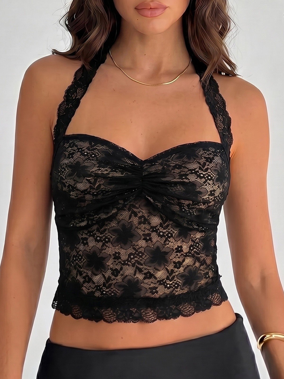 Floral Lace Halter Corset Top – Front Fit View Front fit view of a black floral lace halter corset crop top with cross-back straps.