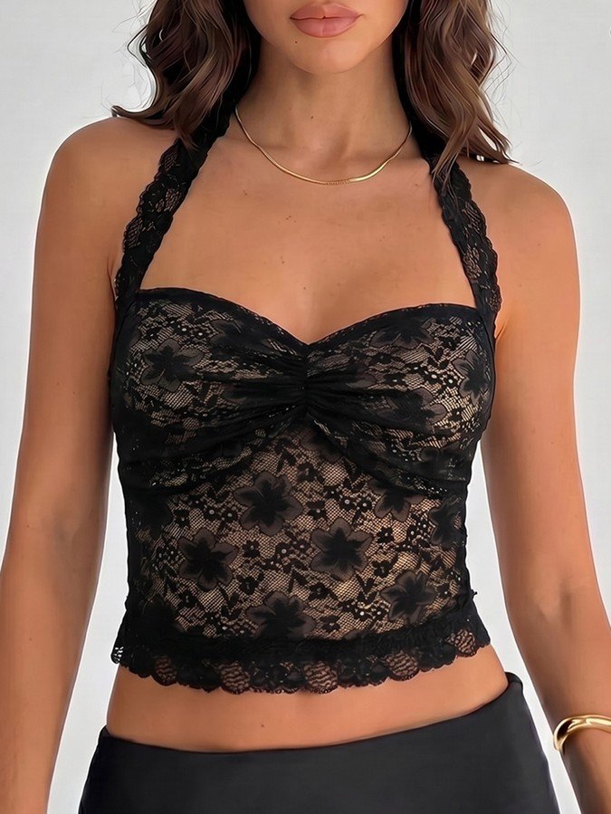 Front fit view of a black floral lace halter corset crop top with cross-back straps.