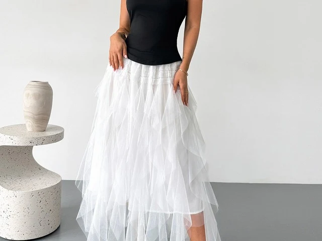 Front view of a corset-bodice tulle midi dress