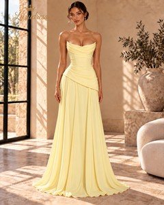 Front view of a butter yellow strapless cowl neck evening gown with a fitted bodice, asymmetric waist and flowing skirt.