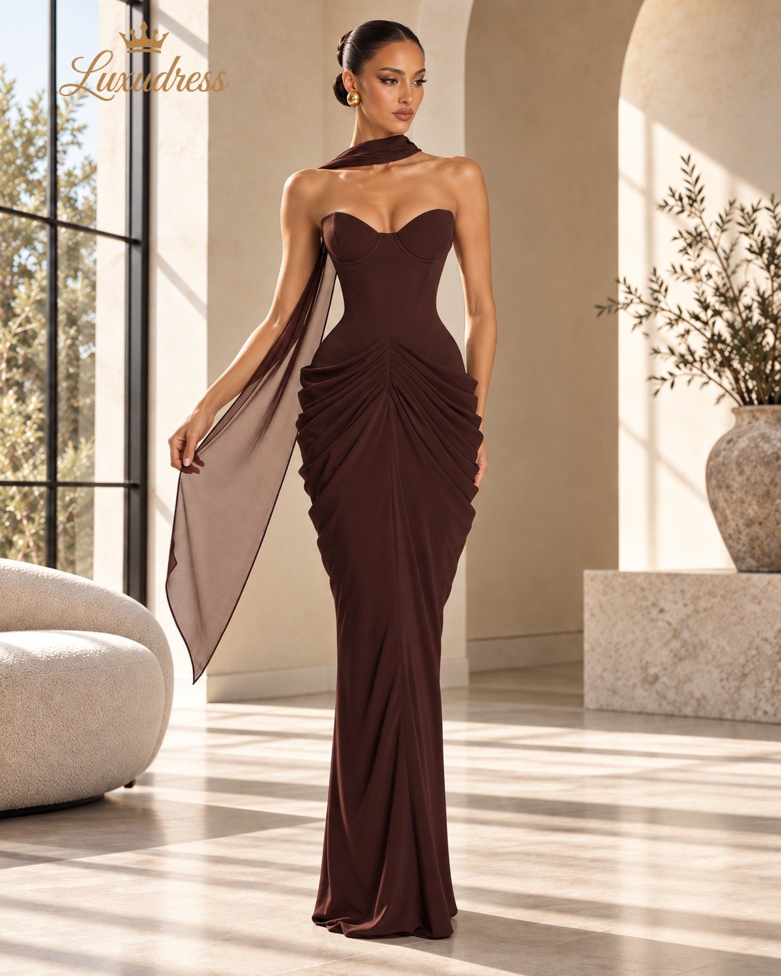 Chocolate Brown Ruched Corset Evening Gown - Front View Front view of a chocolate brown strapless corset evening gown with shaped bust cups, fitted waist and ruched hip draping.