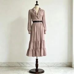 Pink ruffle V-neck tiered midi dress with long sleeves and layered ruffle skirt on dress form