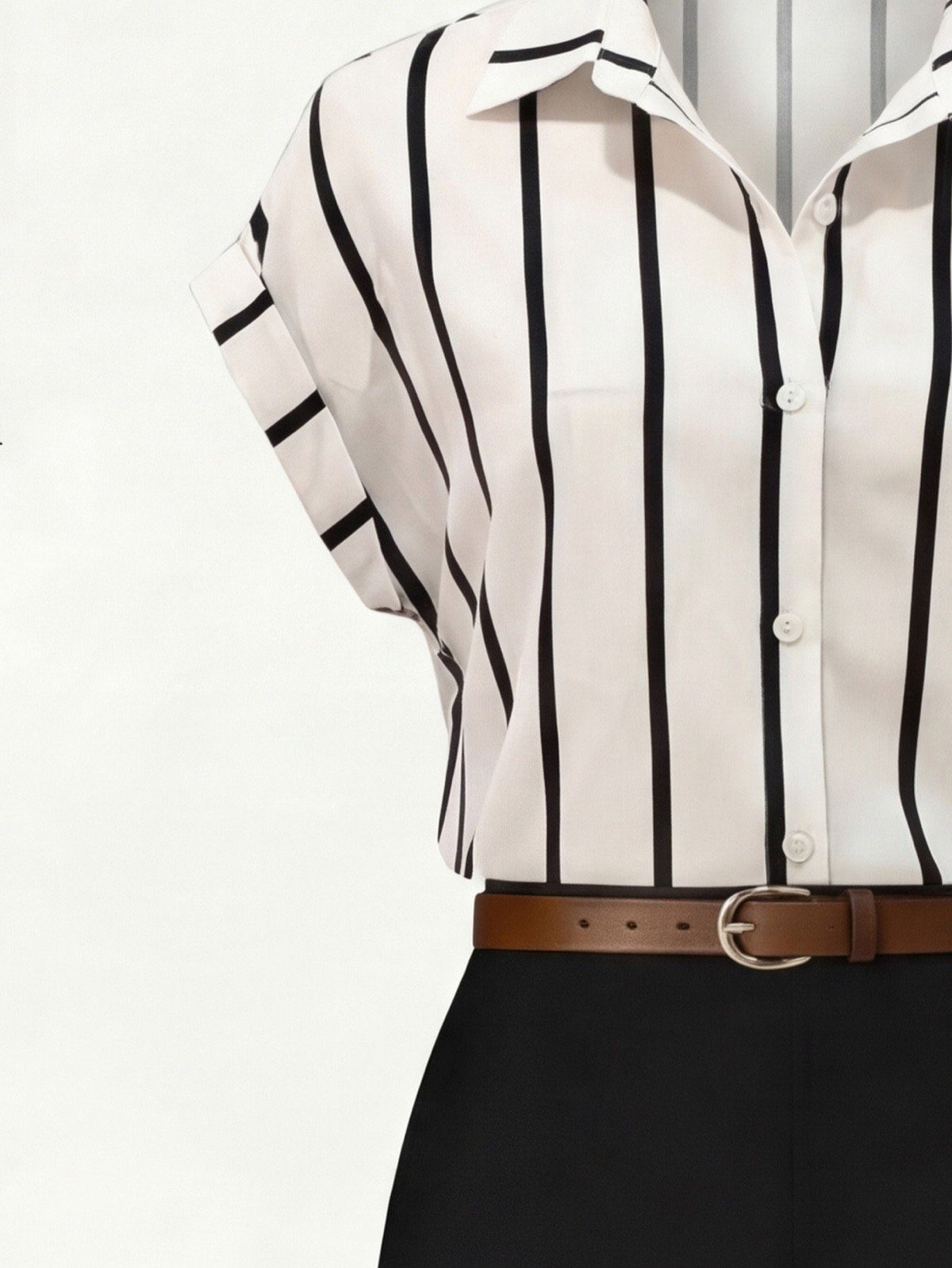 Striped blouse detail of a striped short-sleeve blouse and black wide-leg pants set.