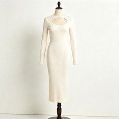 White ribbed knit cutout midi dress with crew neckline and long sleeves