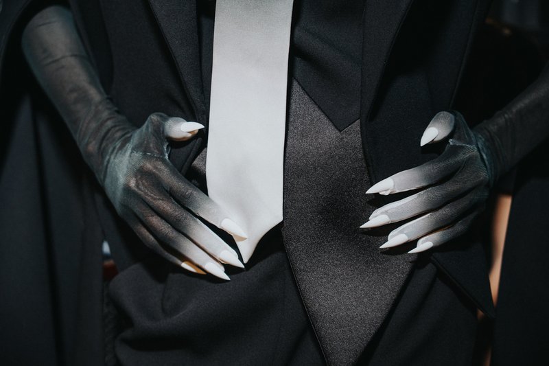 Women in ties return as feminism faces pushback